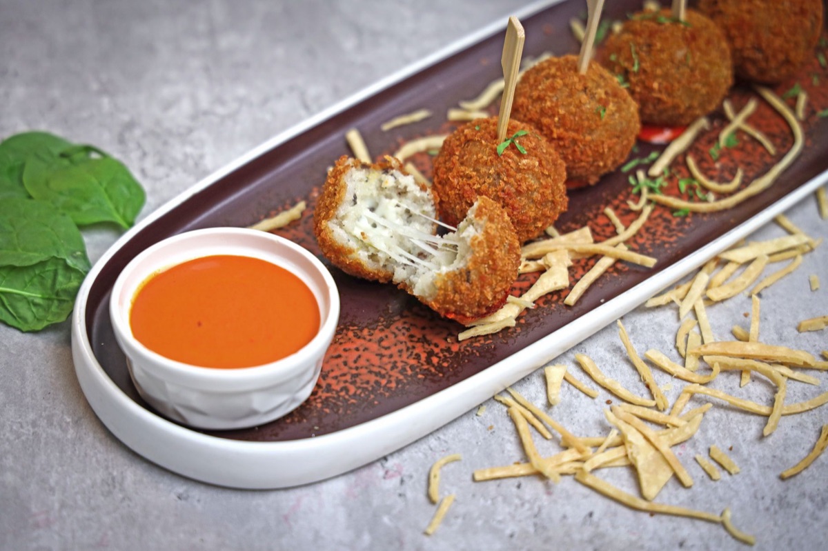 modern arancini with vegetable mixture