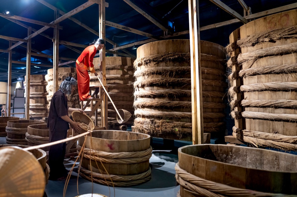 Raw soybeans soaking in water for tofu making
